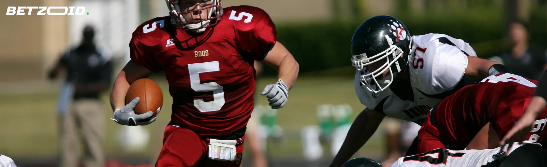American football players in action during a match.