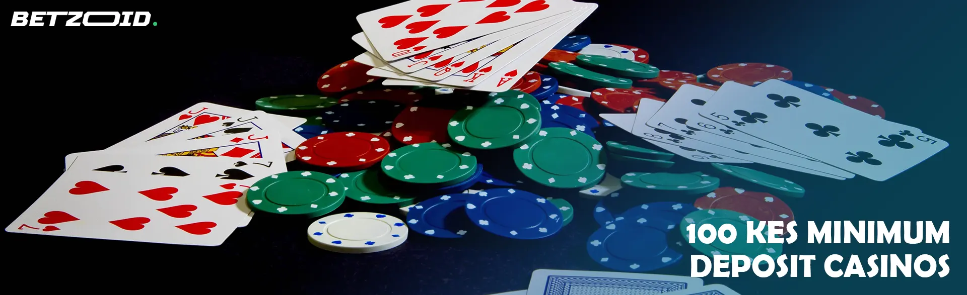 Cards and chips of different colors are laid out on the table.