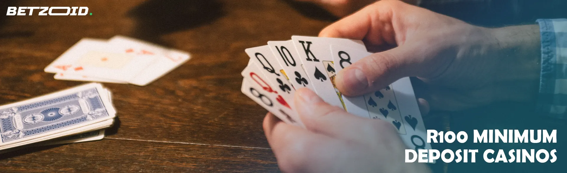 The player holds the cards in his hand during the game.