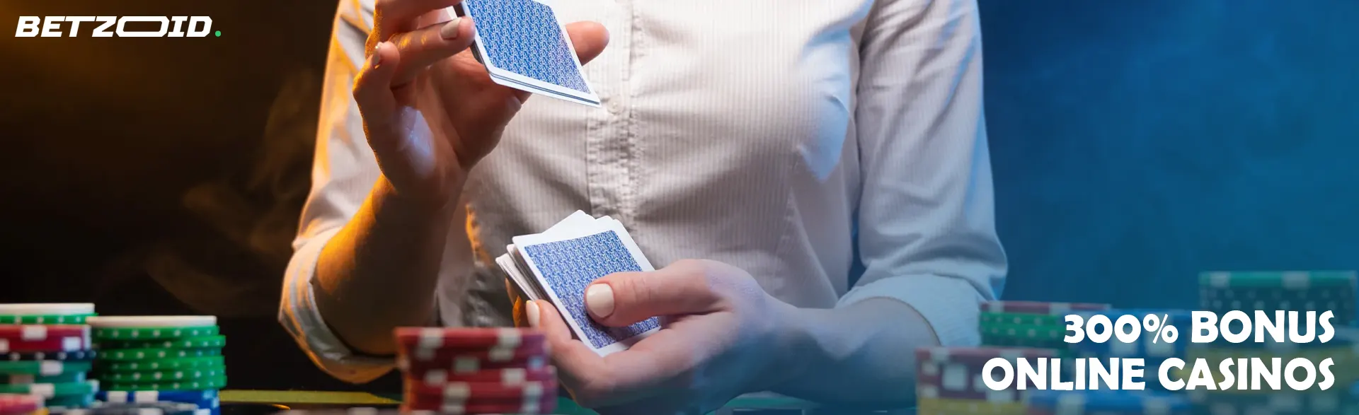 The player shuffles the cards next to the casino chips.