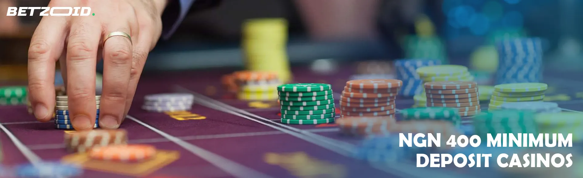 The player places chips on the casino table.