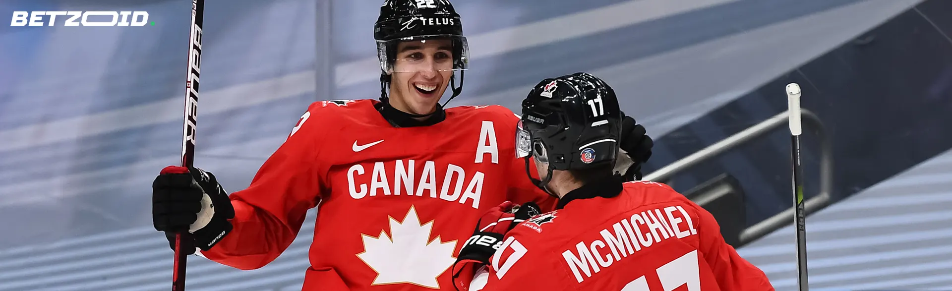 Canadian hockey players celebrate the winning goal.