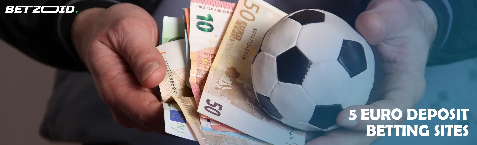 A man holds a ball and euro bills in his hands.