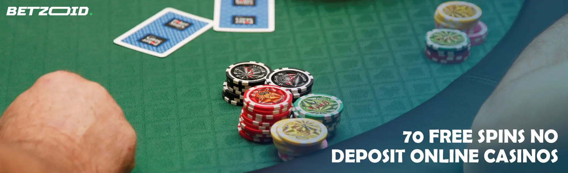 Casino table with cards and chips.