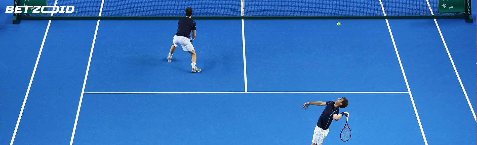 Tennis players on the court during the game.