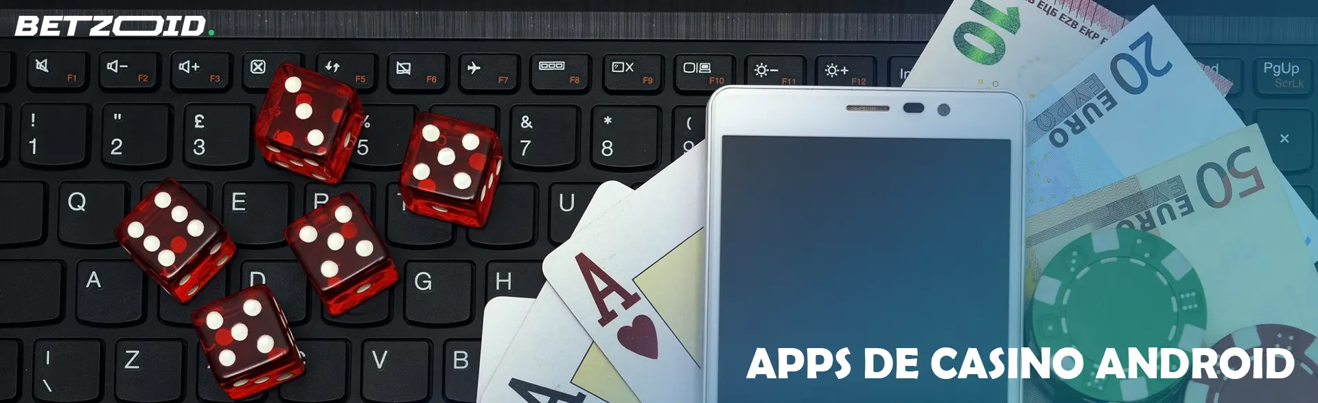 Des dés, un smartphone, des jetons et des billets sur un clavier.