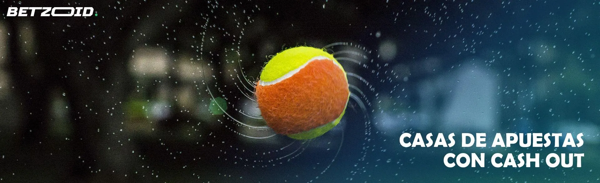 Pelota de tenis en el aire.