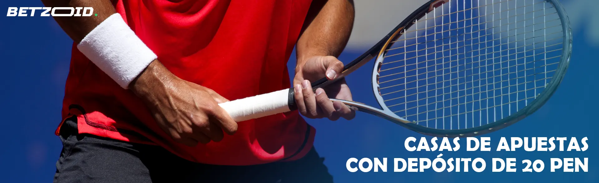 Jugador de tenis con una raqueta en sus manos.