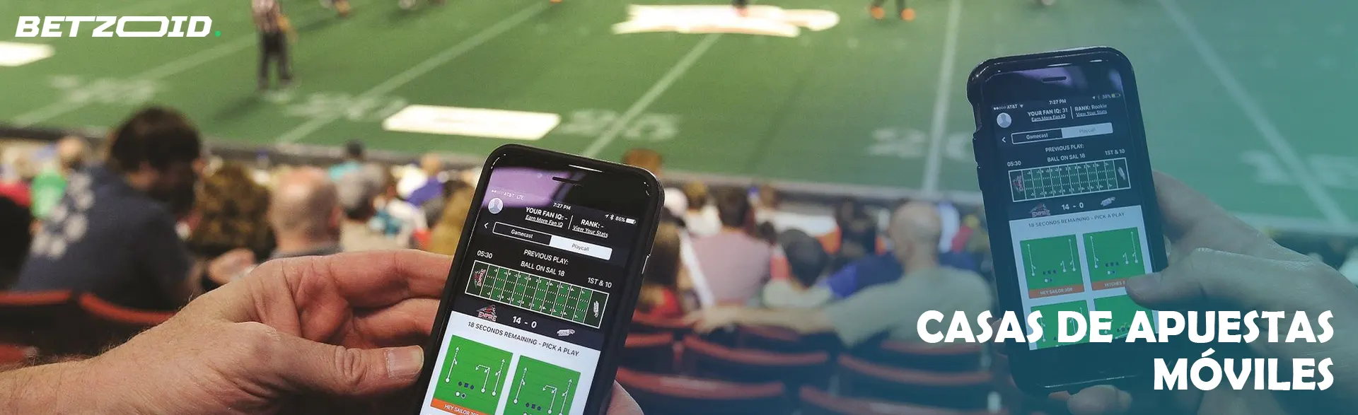 Smartphones con una aplicación de apuestas en manos de personas sentadas en las gradas.