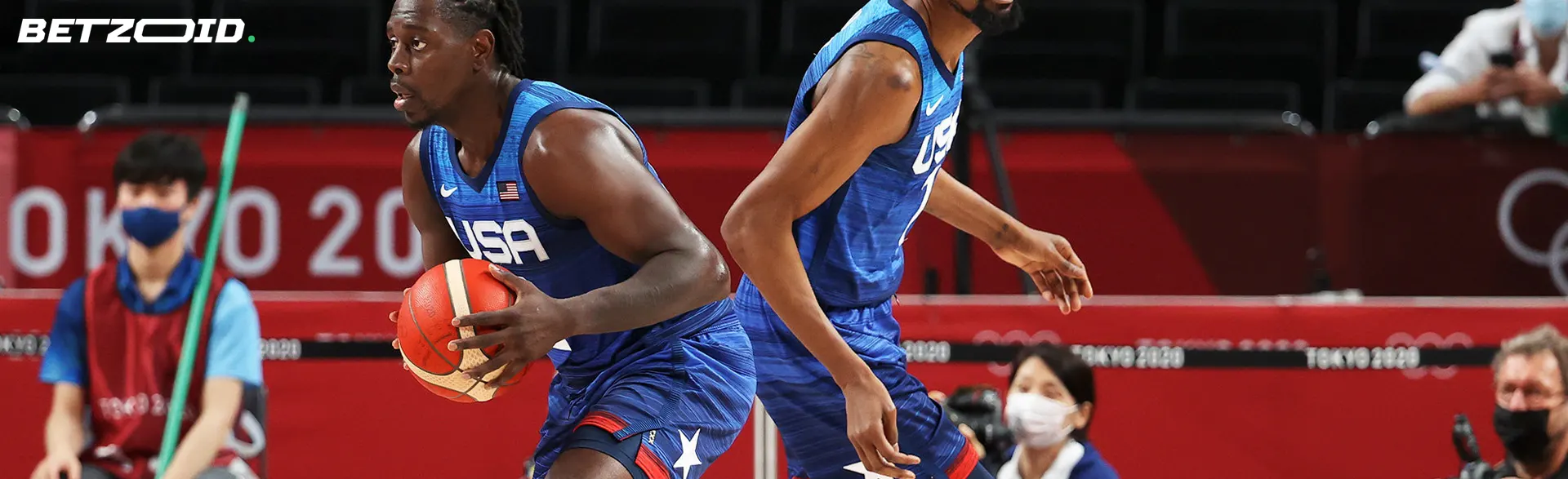 Basketball players in action during the game.