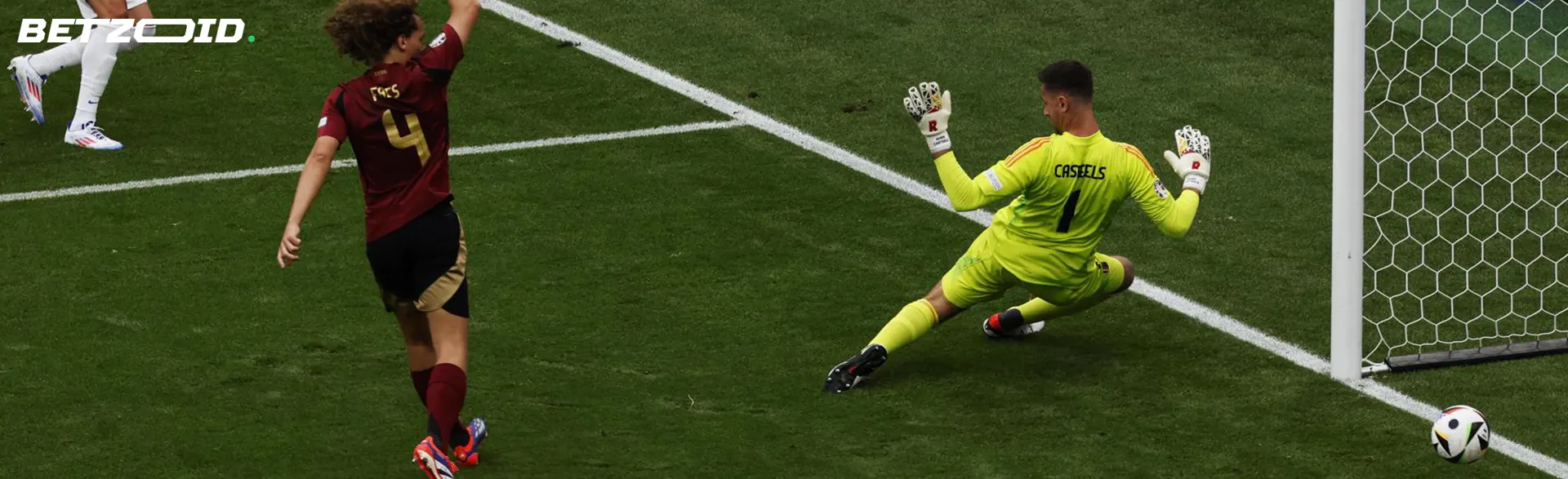 Des footballeurs en action pendant un match.