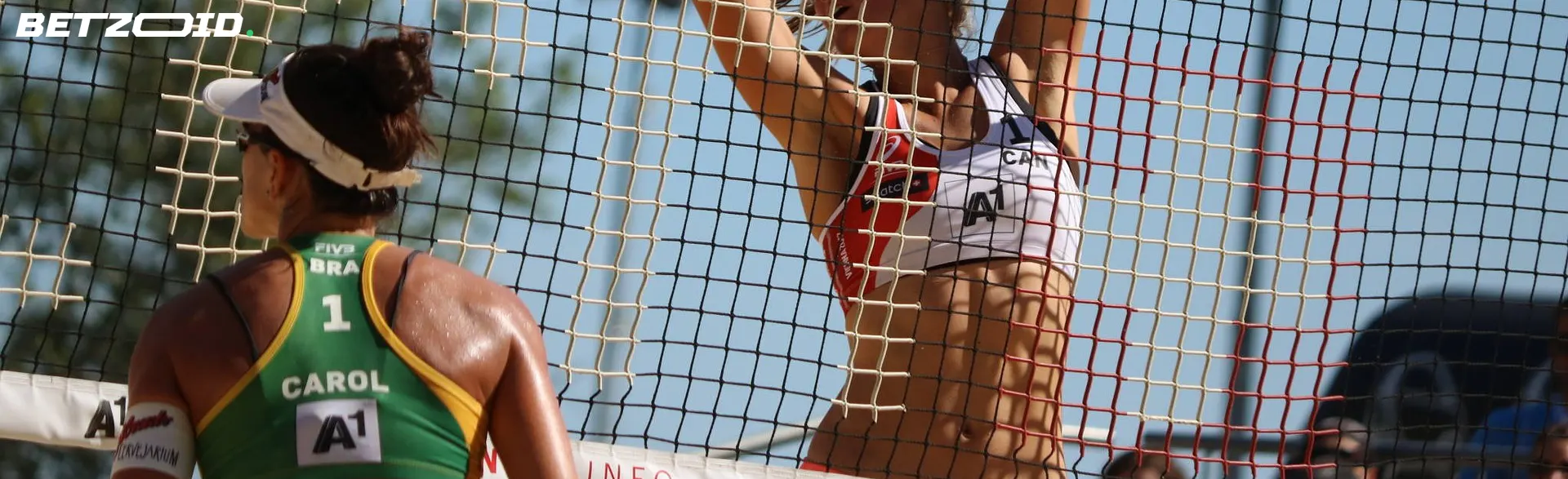 Female volleyball players from Canada and Brazil compete in a match, representing one of the best sites for matched betting Canada has to offer.