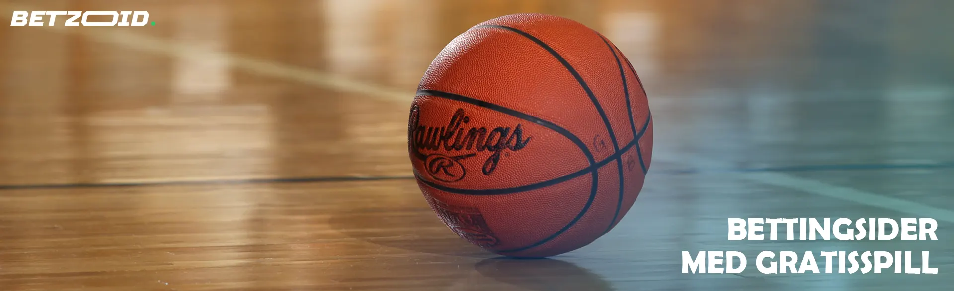 Basketballen ligger på gulvet.