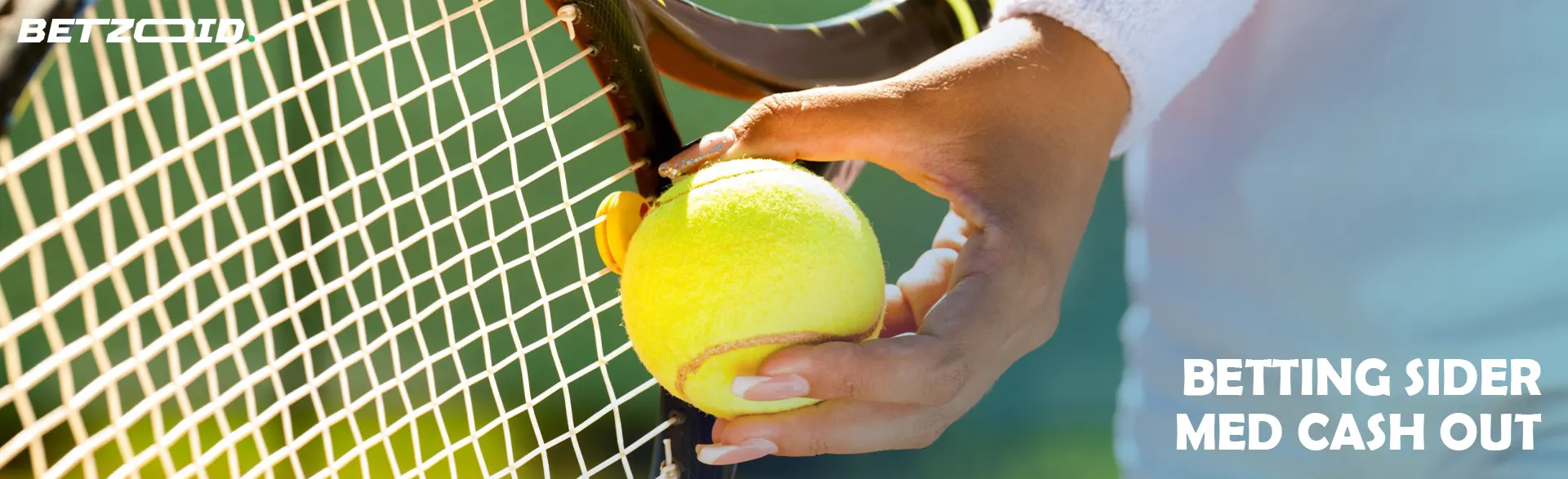 Tennisspilleren lagde bolden til ketsjeren.