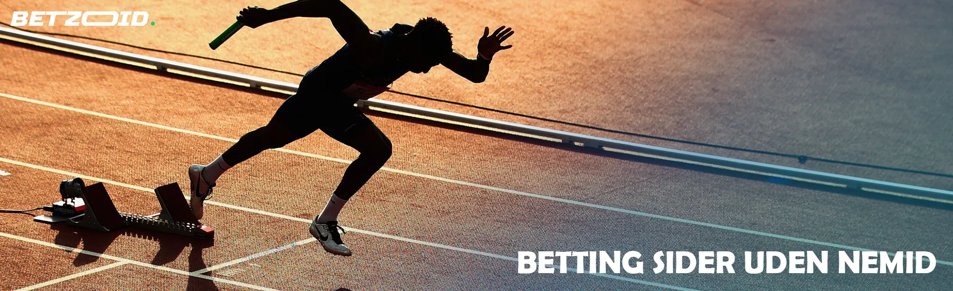 En løber starter på banen.