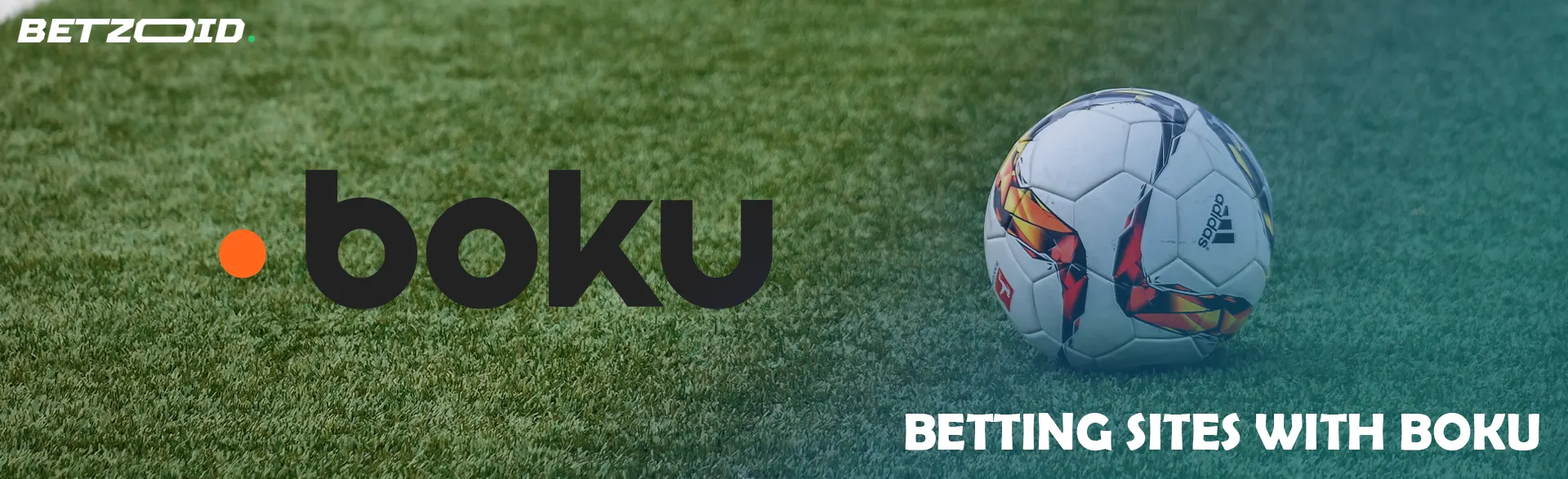 A soccer ball on the grass next to the Boku logo.