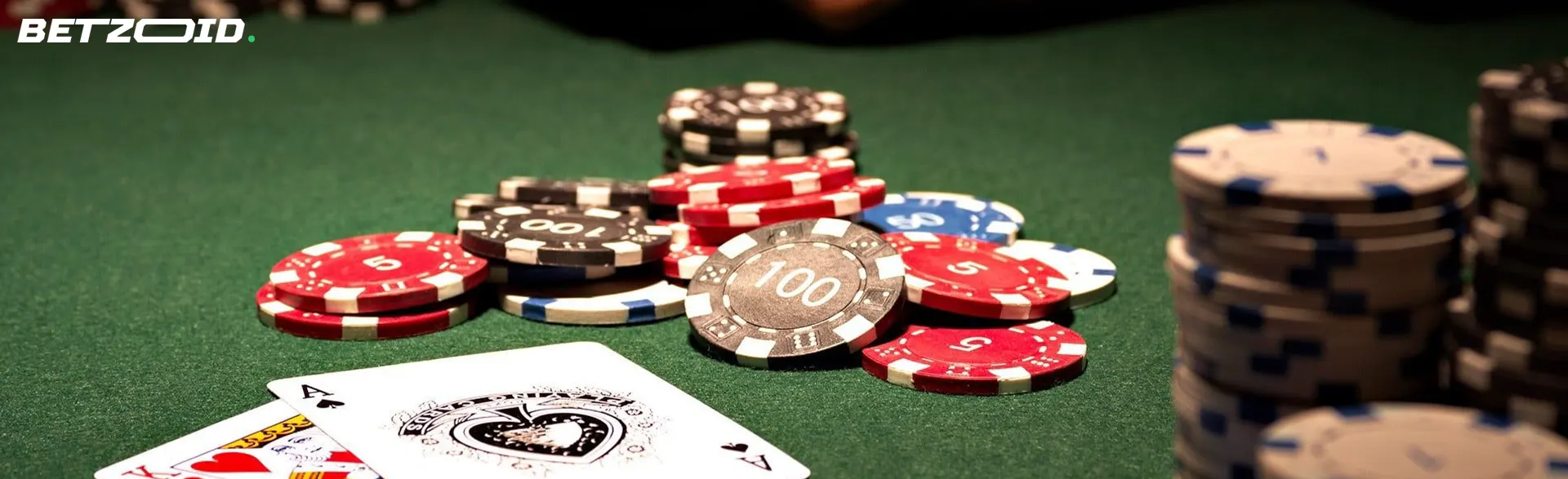 Chips and cards are scattered on the casino table.