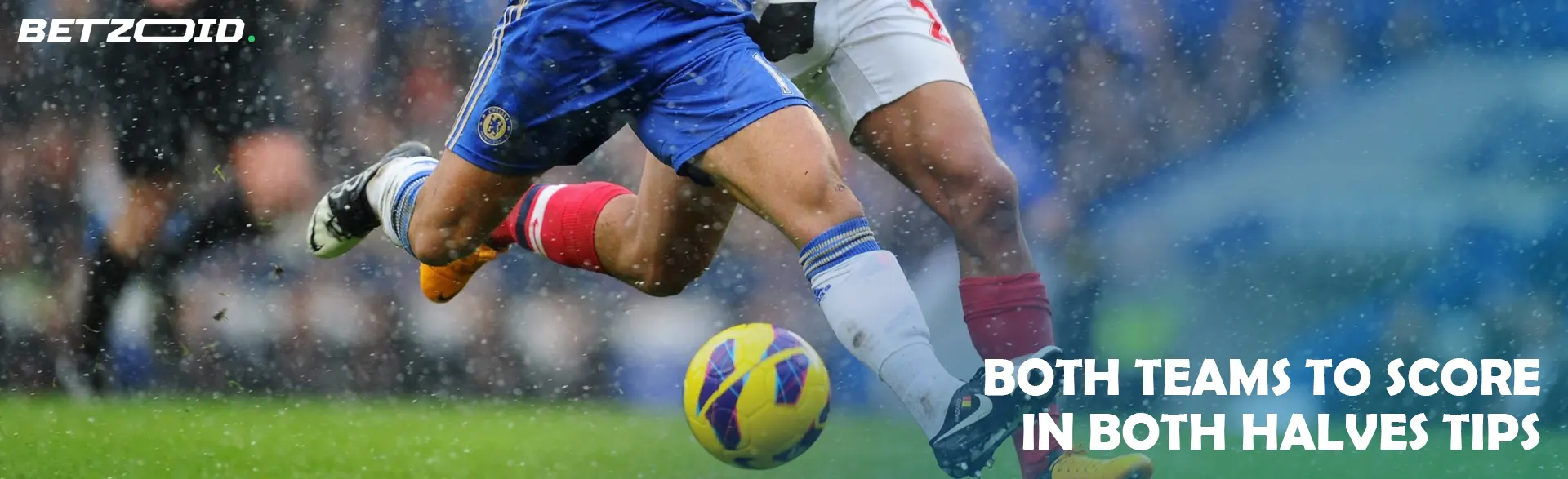 Football player at the moment of collision during the game.