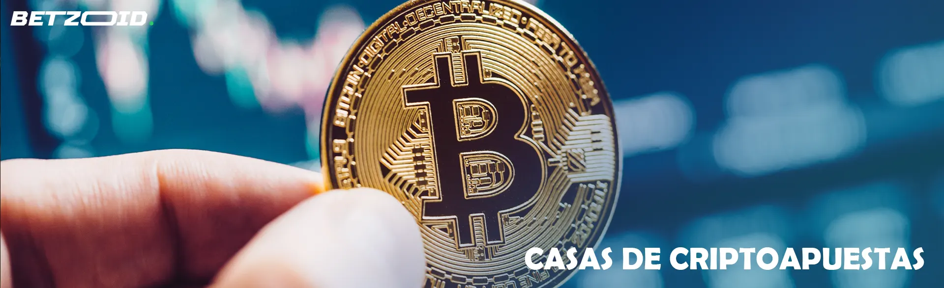 Mano sosteniendo moneda bitcoin.