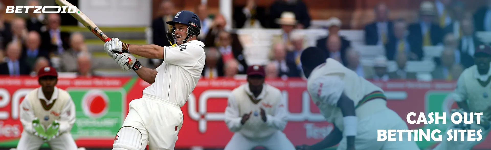 A cricketer hits the ball.