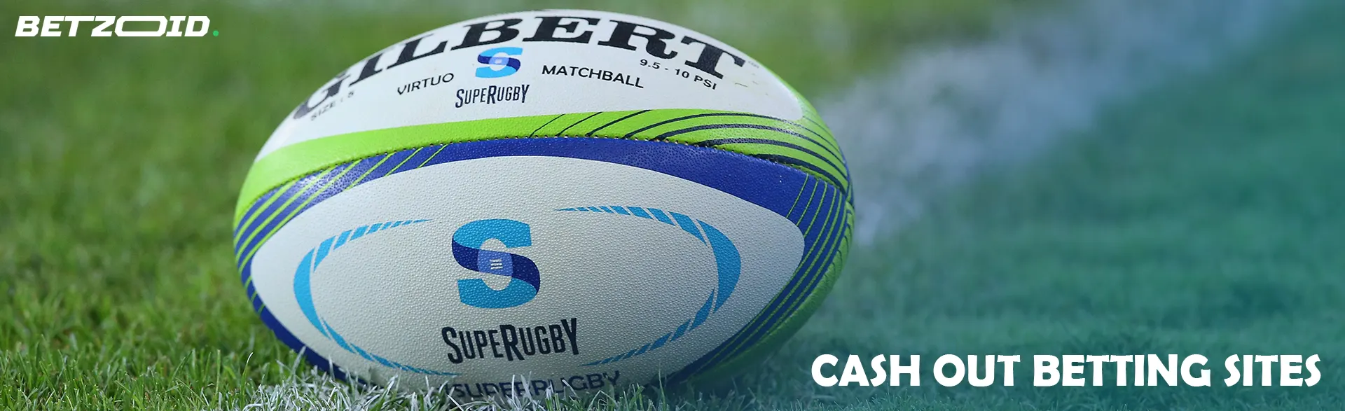 The rugby ball lies on the grass.
