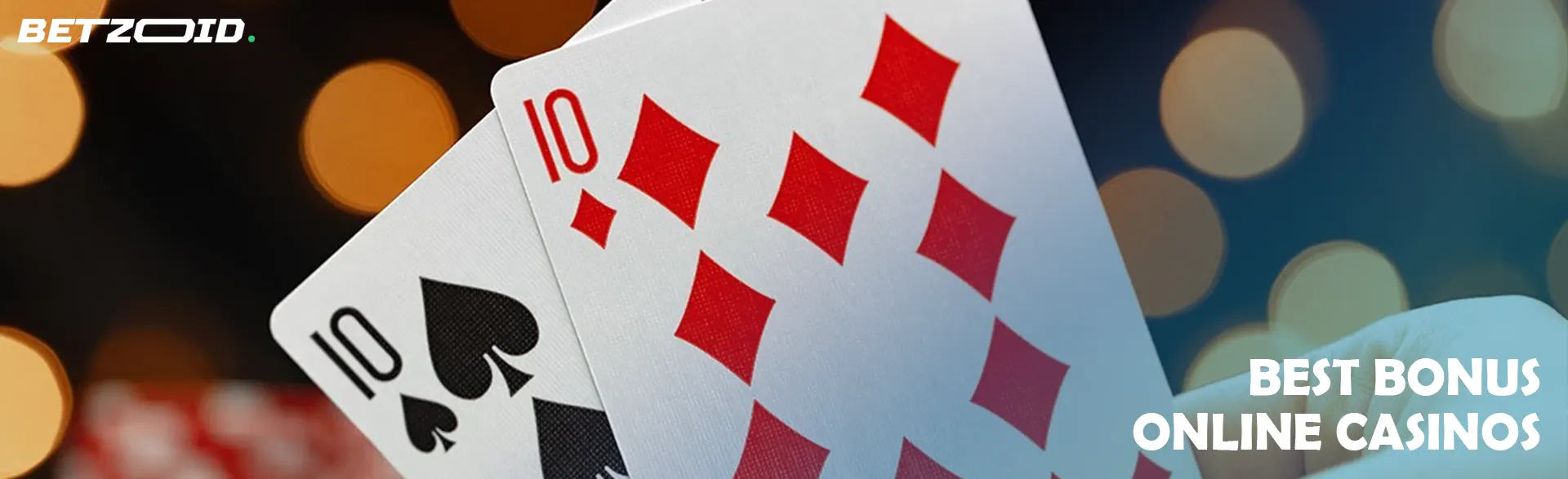 Two cards on the background of casino lights.