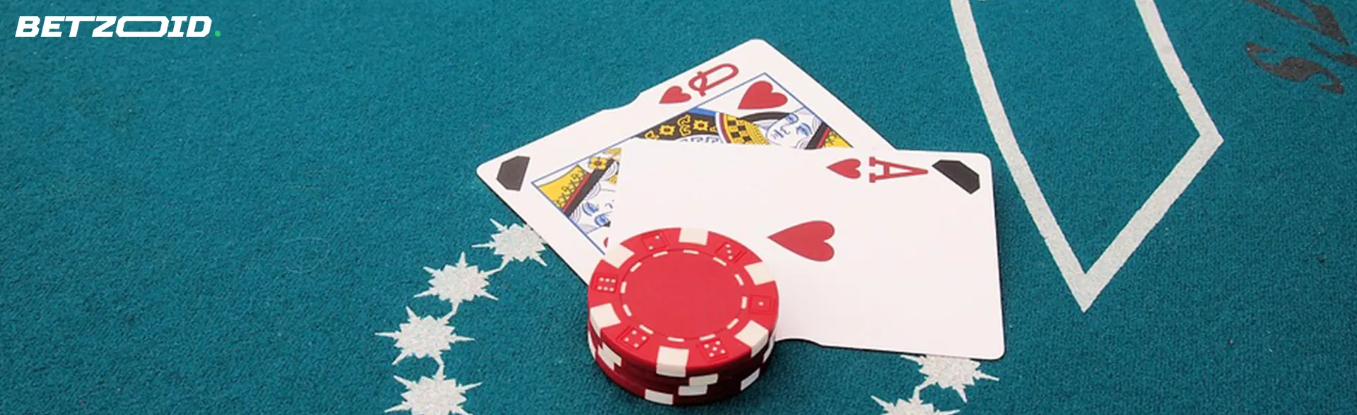 The image shows a pair of playing cards, the ace and queen of hearts, slightly fanned out next to a red casino chip. 
