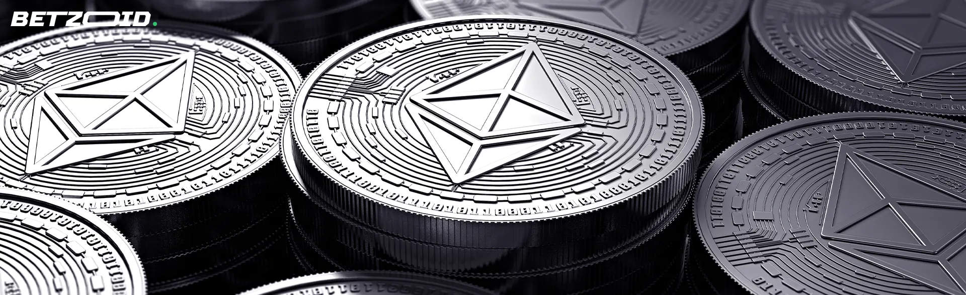 Des pièces argentées de cryptomonnaie Ethereum.