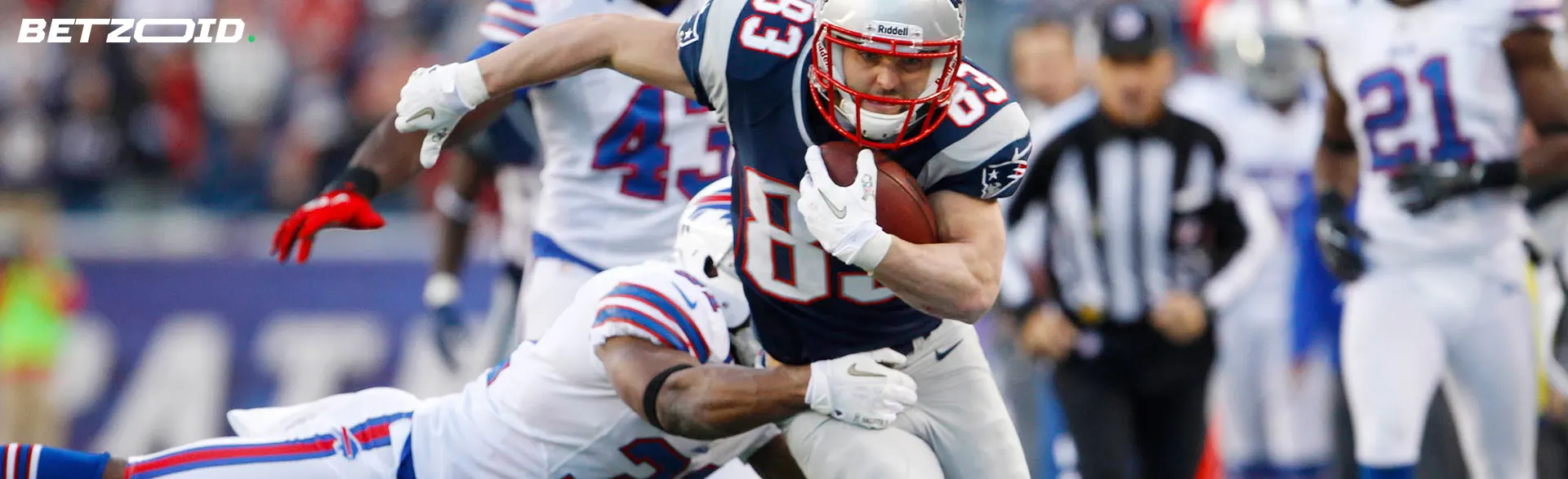 American football players in action during a match.