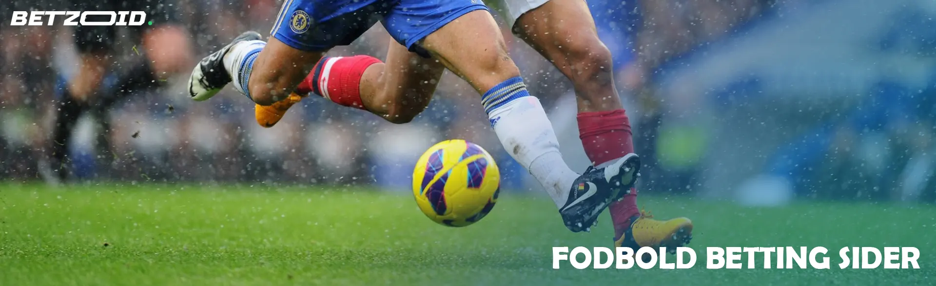 Fodboldspillere kæmper om bolden under kampen.