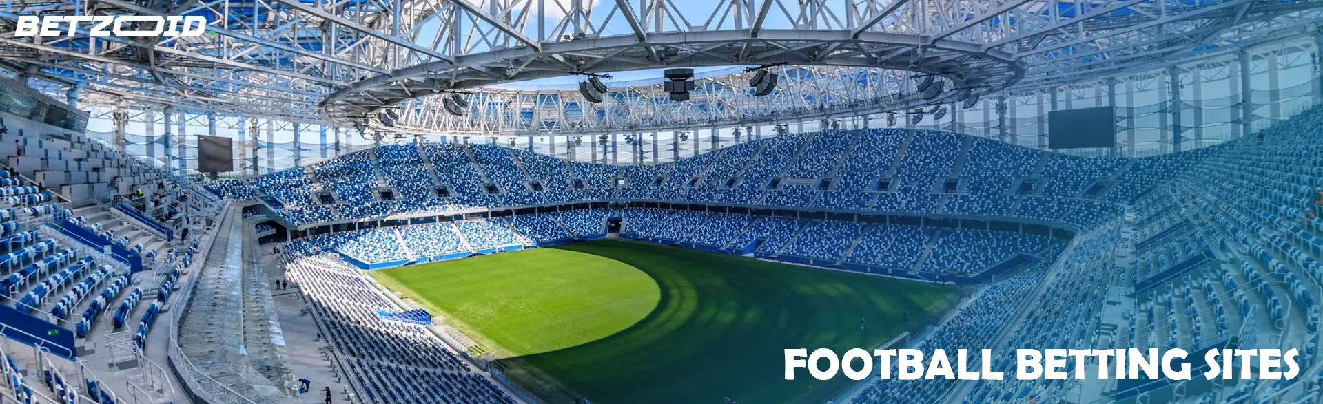 A large empty football stadium.