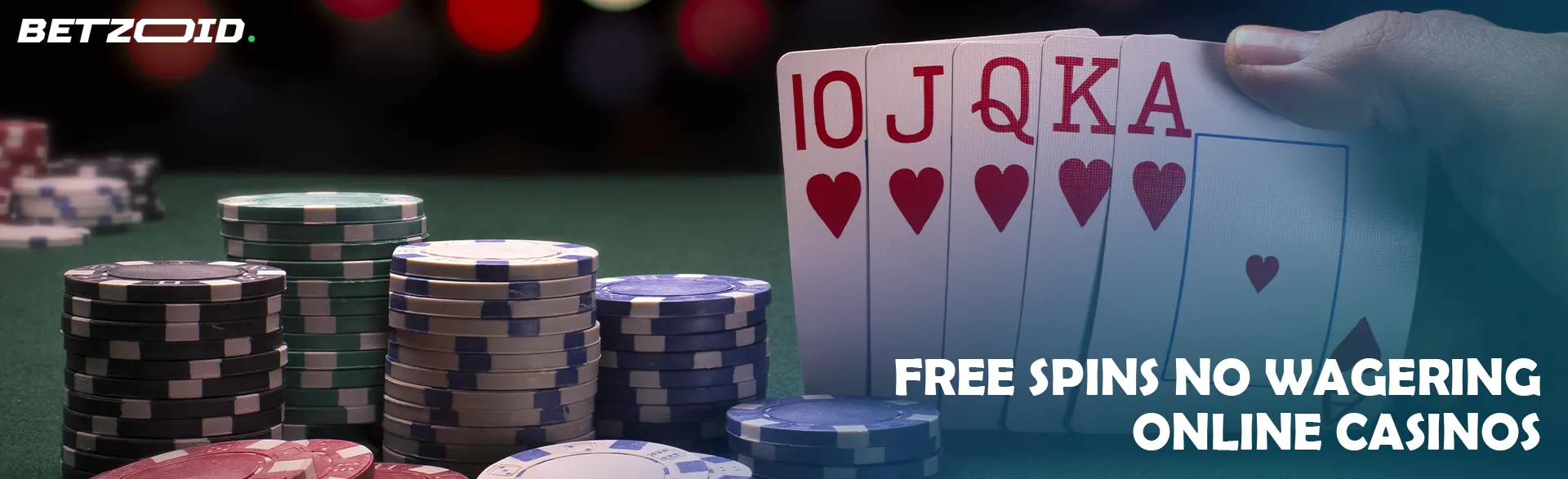 The player holds the cards next to the casino chips.