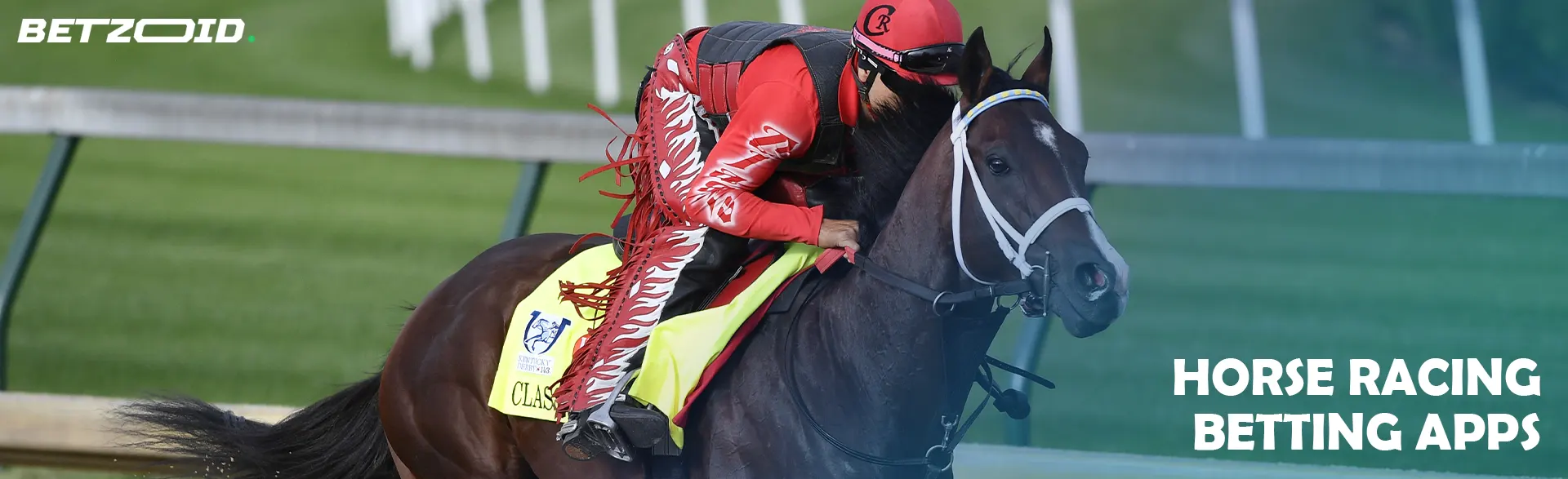 A jockey on a horse during a horse race.