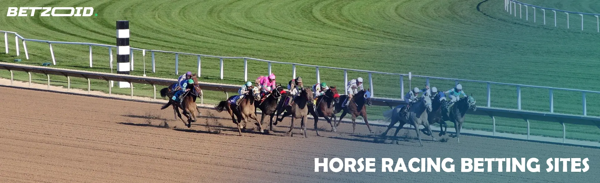 A group of riders during a race on a racetrack.