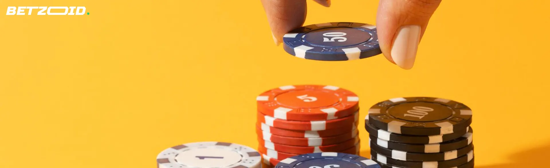 The player puts casino chips on the table.