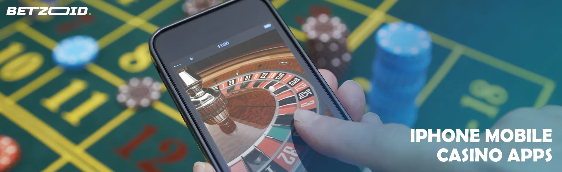 Player holding smartphone with online roulette.