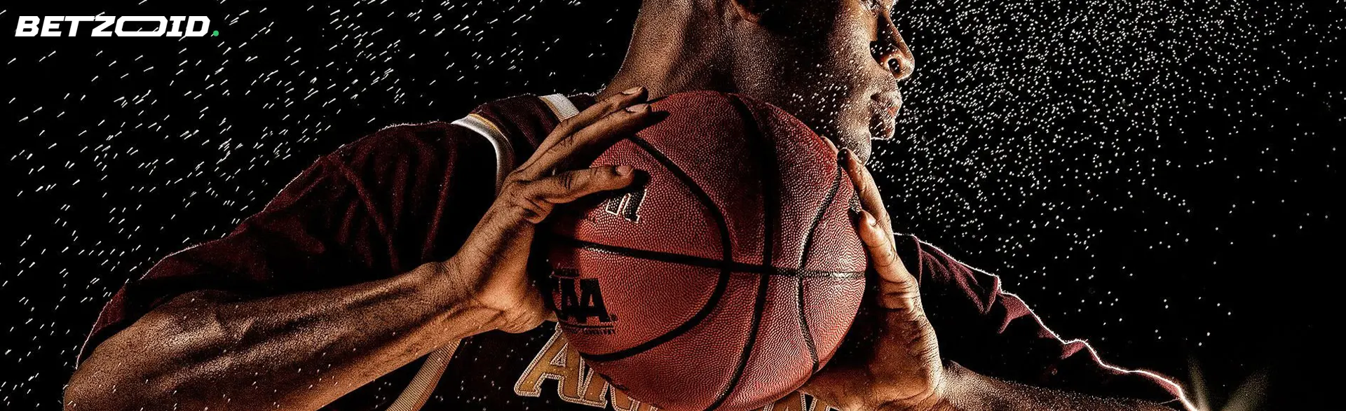 A player prepares to shoot a basketball.