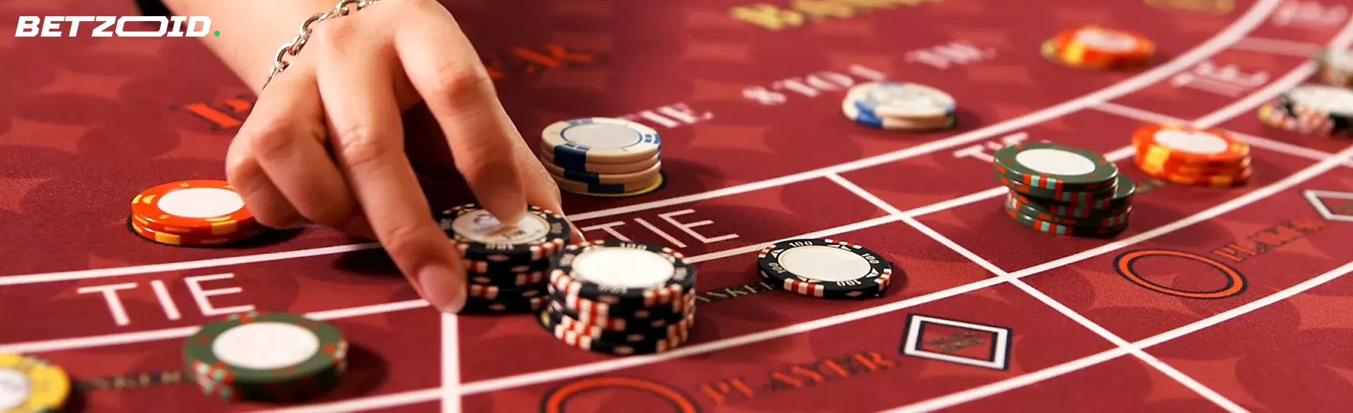 A player places chips on the casino table.