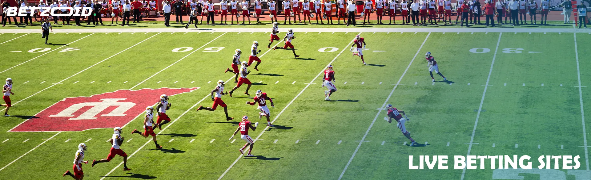 American football players on the field during the match.