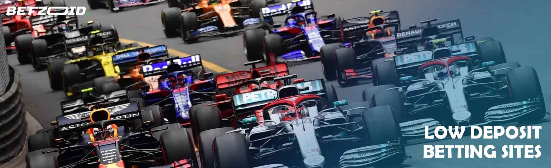 Formula 1 cars on the track during the race.