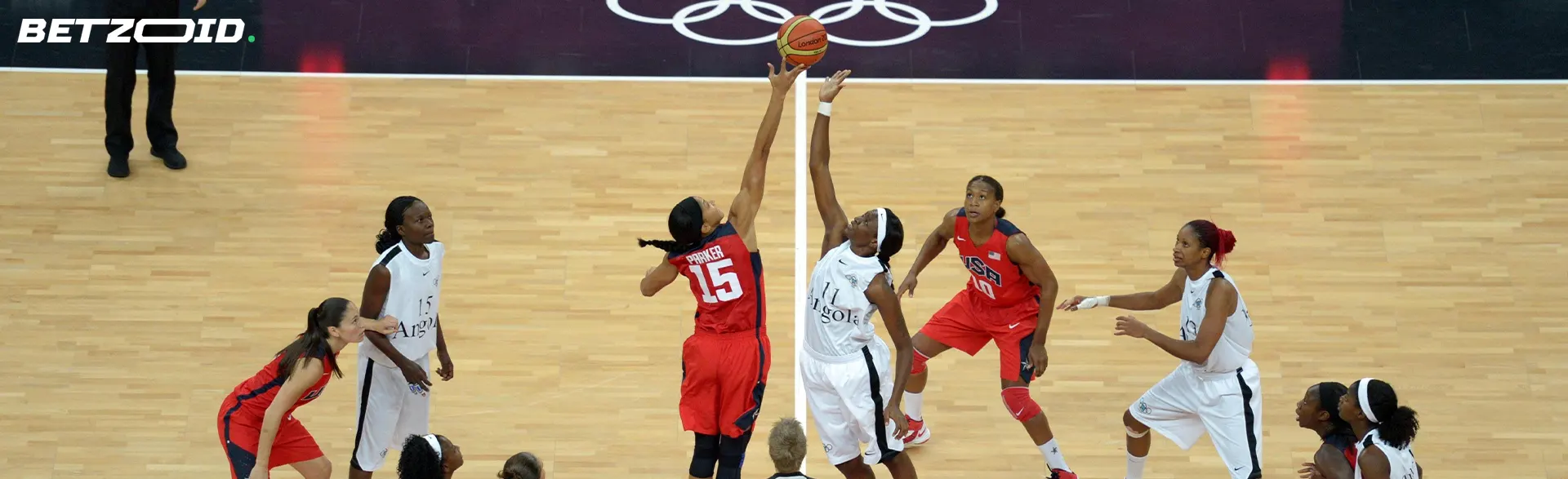 Basketball players in action during a match.