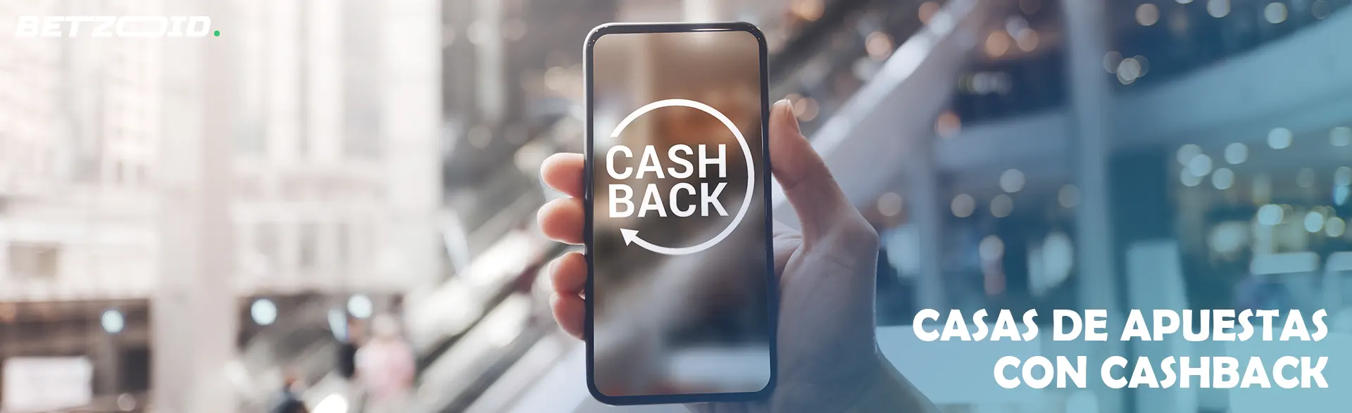 Teléfono móvil con la palabra cashback en pantalla.