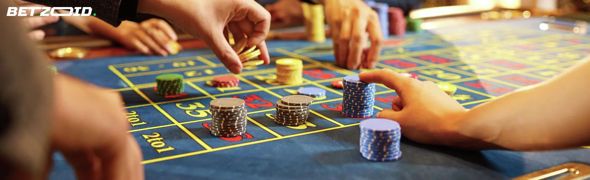 Players place bets on the casino table.