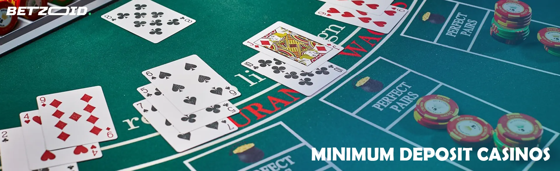 Cards and chips on the casino table.