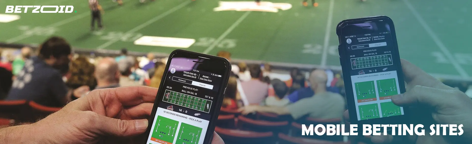 People holding smartphones with bets in the stands.