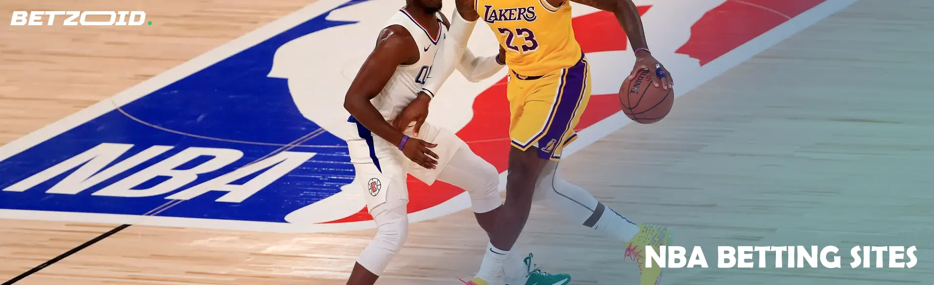 Basketball players on court with NBA logo.