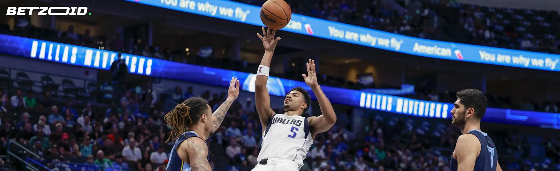 Basketball players in action during a match.