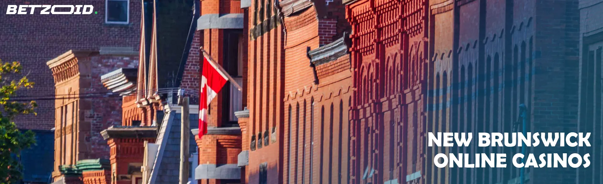Historic brick buildings with a Canadian flag in New Brunswick, symbolizing the local charm of New Brunswick online casinos.