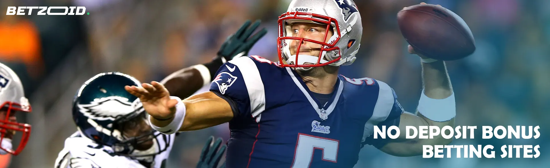 An American football player prepares to throw the ball.