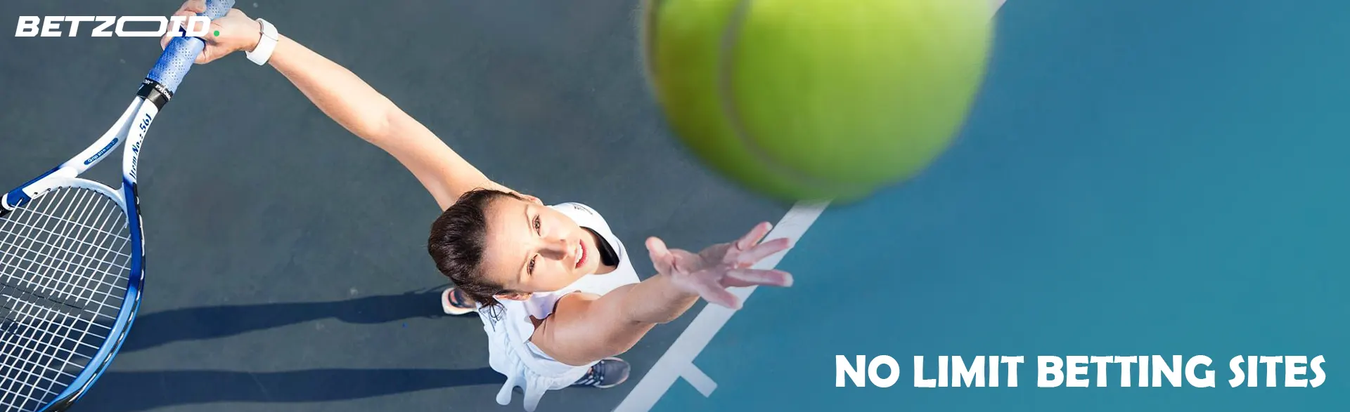 A female tennis player tries to hit the ball.